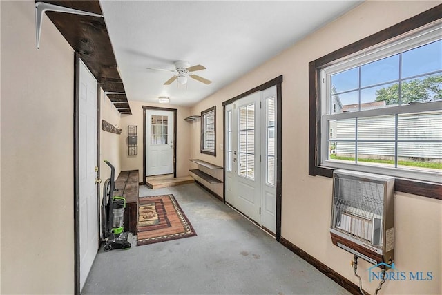 4279 Defiance Pike, Wayne, OH 43466 - doorway with concrete floors, baseboards, ceiling fan, and heating unit