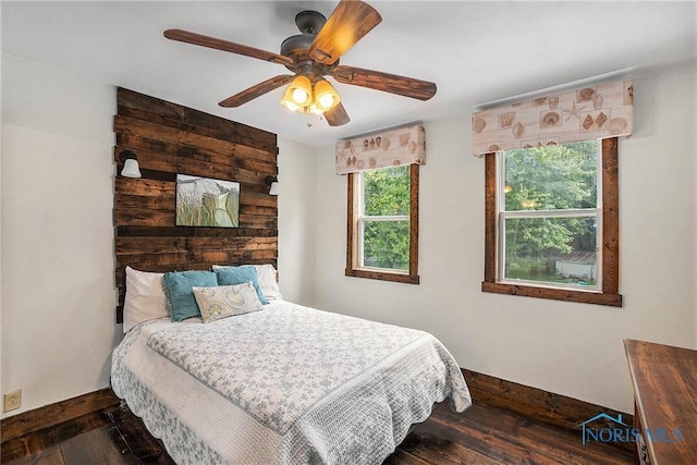 4279 Defiance Pike, Wayne, OH 43466 - bedroom with baseboards, dark wood-style flooring, and ceiling fan