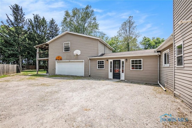 4279 Defiance Pike, Wayne, OH 43466 - view of front of home with dirt driveway and a garage