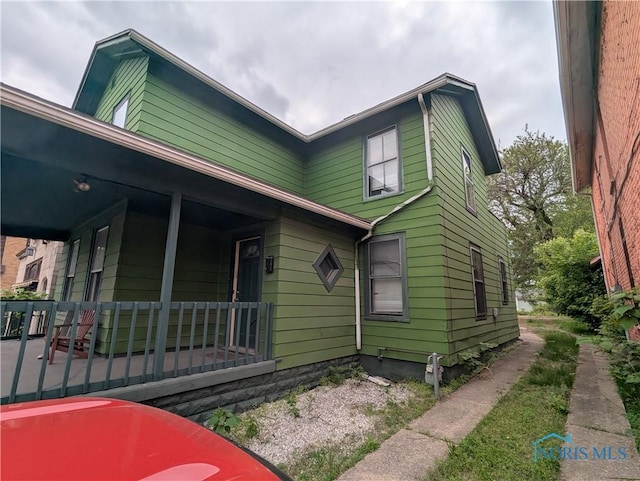 721 N Detroit Ave, Toledo, OH 43607 - view of front facade with a porch