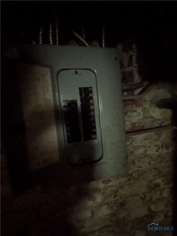721 N Detroit Ave, Toledo, OH 43607 - utility room featuring electric panel