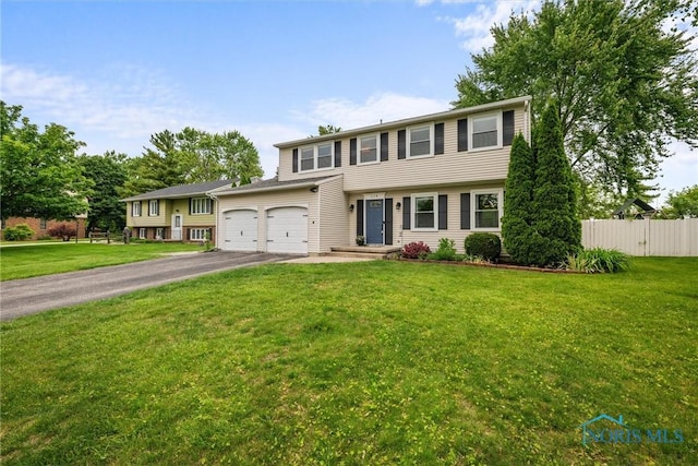 119 Mallard Rd, Perrysburg, OH 43551 - view of front facade with asphalt driveway and an attached garage