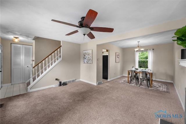 119 Mallard Rd, Perrysburg, OH 43551 - living room with a chandelier, carpet floors, and baseboards