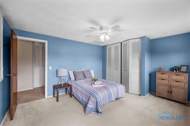 119 Mallard Rd, Perrysburg, OH 43551 - bedroom featuring light carpet, baseboards, a ceiling fan, and a closet