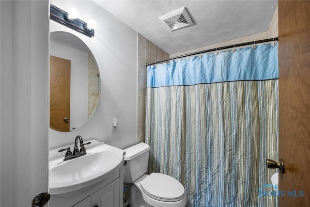 119 Mallard Rd, Perrysburg, OH 43551 - bathroom featuring toilet and vanity