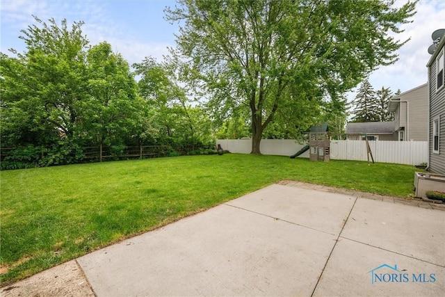 119 Mallard Rd, Perrysburg, OH 43551 - view of yard featuring a playground and a patio area