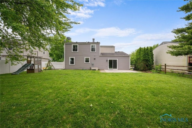 119 Mallard Rd, Perrysburg, OH 43551 - rear view of house featuring a playground and a patio