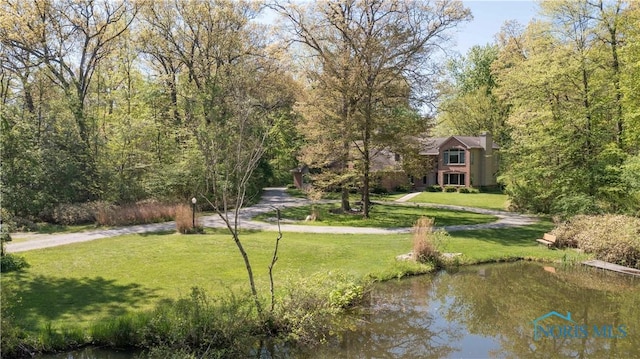 8801 W Bancroft St, Toledo, OH 43617 - view of home's community with a lawn