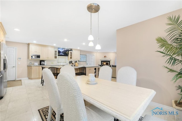 8801 W Bancroft St, Toledo, OH 43617 - dining area with baseboards and recessed lighting
