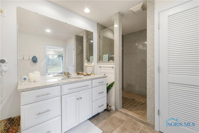 8801 W Bancroft St, Toledo, OH 43617 - full bath with vanity, a walk in shower, and recessed lighting
