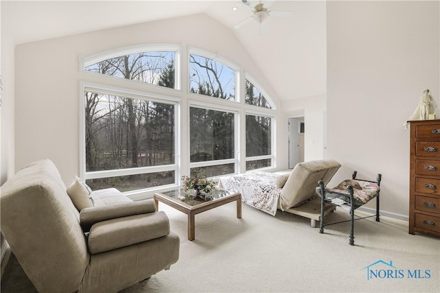 8801 W Bancroft St, Toledo, OH 43617 - living room with vaulted ceiling, ceiling fan, and carpet floors