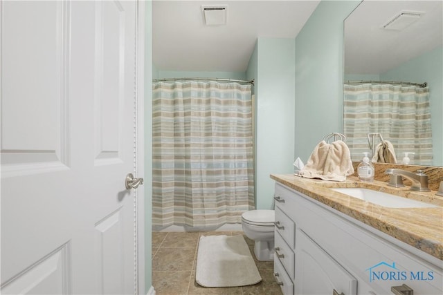 8801 W Bancroft St, Toledo, OH 43617 - bathroom featuring vanity, toilet, a shower with curtain, and tile patterned flooring