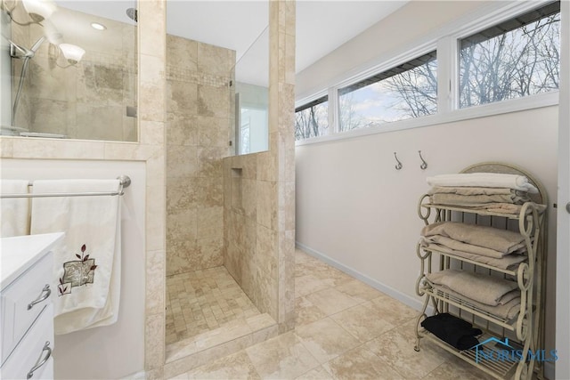 8801 W Bancroft St, Toledo, OH 43617 - bathroom with vanity, walk in shower, and baseboards