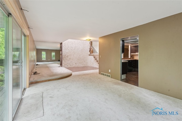 1250 Hidden Ridge Rd, Toledo, OH 43615 - carpeted spare room featuring stairs