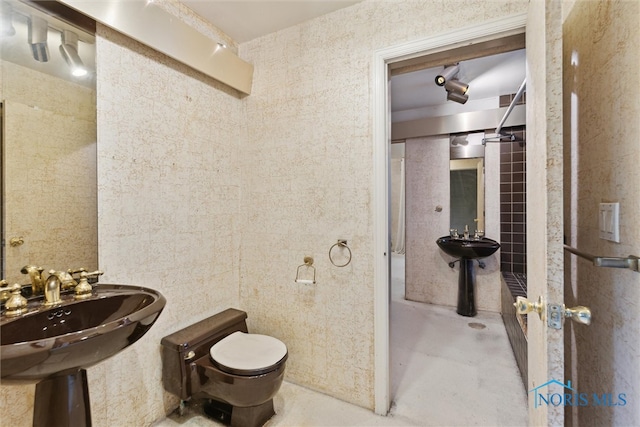 1250 Hidden Ridge Rd, Toledo, OH 43615 - full bathroom with toilet and concrete floors