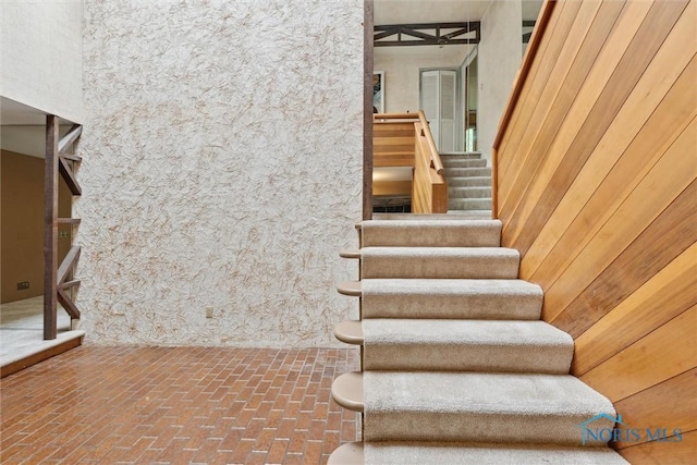 1250 Hidden Ridge Rd, Toledo, OH 43615 - stairs with brick flooring