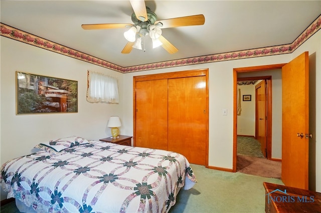1306 N Union St, Fostoria, OH 44830 - carpeted bedroom featuring a closet and ceiling fan