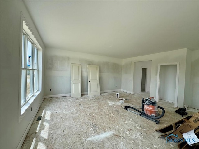 1912 Caleb Ct, Waterville, OH 43566 - unfurnished bedroom with baseboards