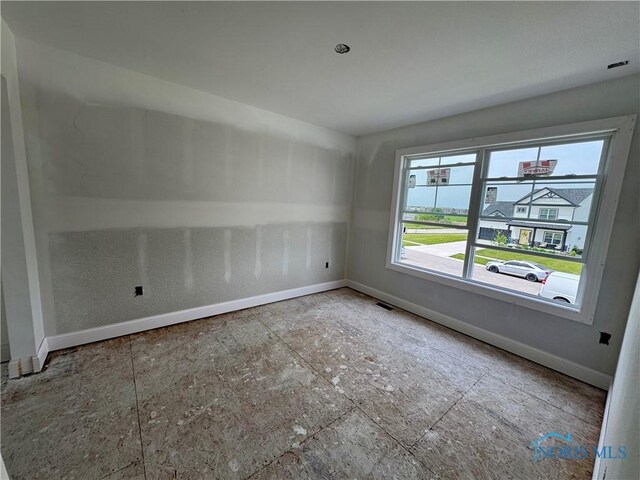 1912 Caleb Ct, Waterville, OH 43566 - unfurnished room featuring baseboards