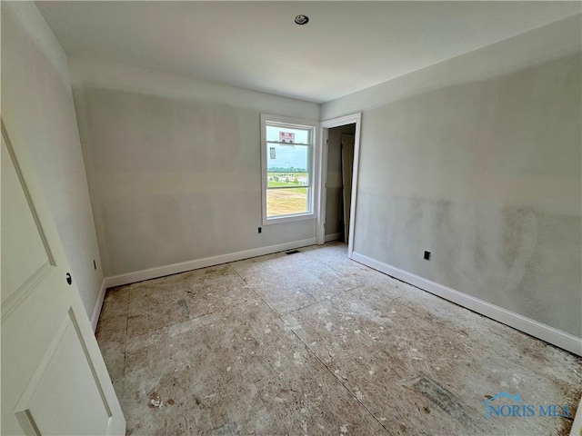 1912 Caleb Ct, Waterville, OH 43566 - spare room featuring baseboards