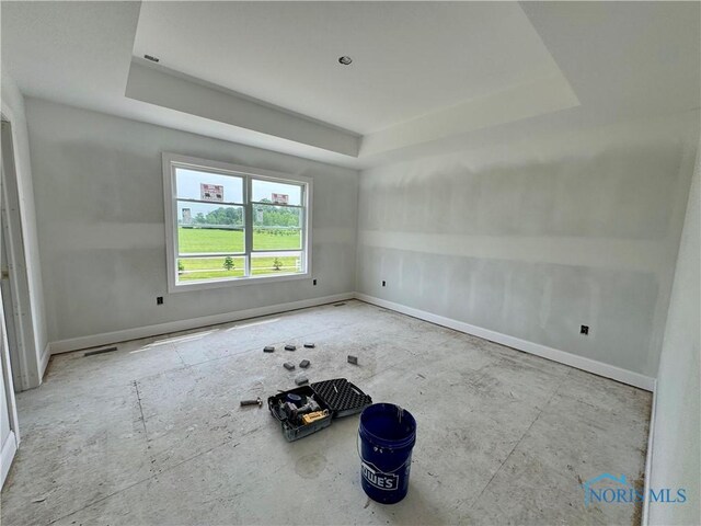 1912 Caleb Ct, Waterville, OH 43566 - unfurnished room featuring a raised ceiling and baseboards