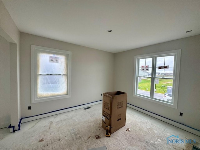 5443 Osprey Ln, Sylvania, OH 43560 - unfurnished bedroom featuring a baseboard heating unit and baseboard heating