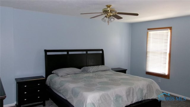 640 Hemlock St, Wauseon, OH 43567 - carpeted bedroom featuring baseboards and ceiling fan