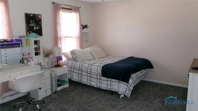 640 Hemlock St, Wauseon, OH 43567 - bedroom featuring dark carpet and an office area