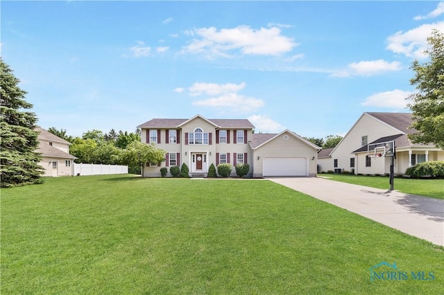 640 Hemlock St, Wauseon, OH 43567 - colonial inspired home with driveway and an attached garage