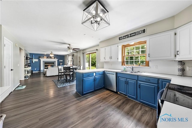640 Hemlock St, Wauseon, OH 43567 - kitchen with blue cabinetry, stainless steel dishwasher, range with electric stovetop, and open floor plan