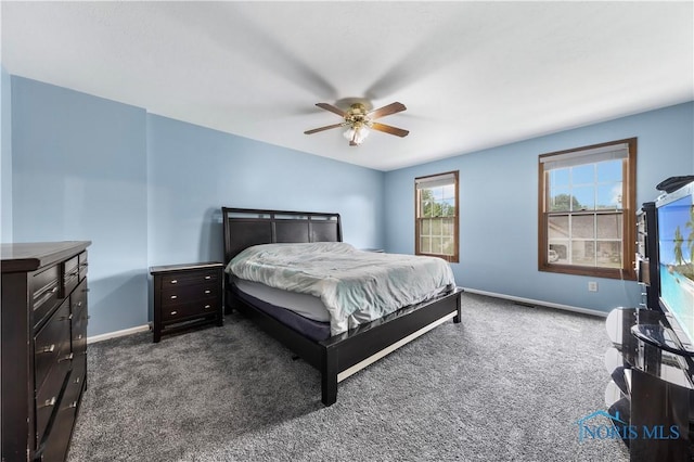640 Hemlock St, Wauseon, OH 43567 - bedroom featuring dark colored carpet and ceiling fan