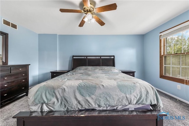 640 Hemlock St, Wauseon, OH 43567 - carpeted bedroom featuring baseboards and a ceiling fan