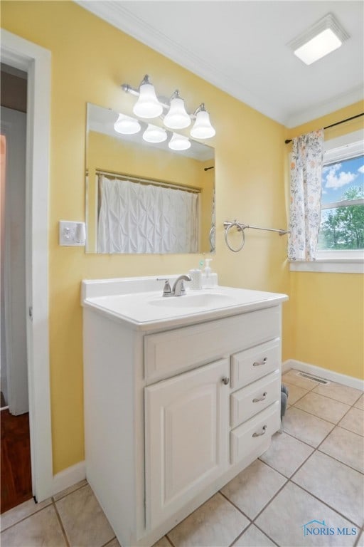 404 W Yates Ave, Findlay, OH 45840 - bathroom featuring vanity, tile patterned floors, and baseboards