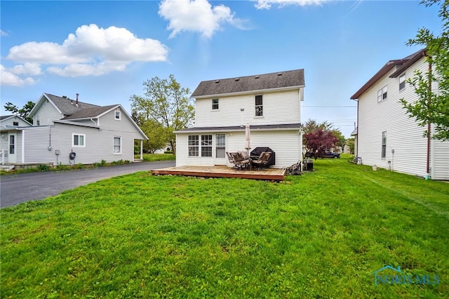 404 W Yates Ave, Findlay, OH 45840 - back of house with a deck and a yard