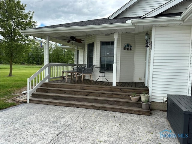 20515 Lockwood Rd, Defiance, OH 43512 - entrance to property with covered porch, a shingled roof, a lawn, and ceiling fan