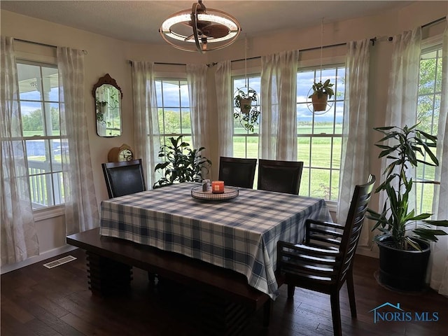 20515 Lockwood Rd, Defiance, OH 43512 - dining room with dark wood-style floors and baseboards