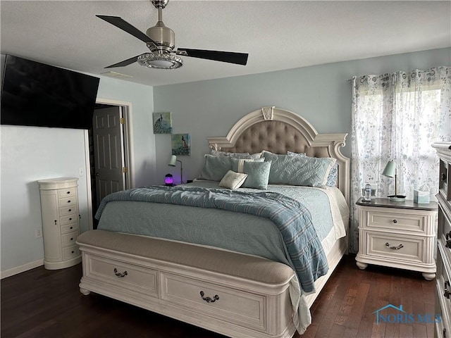 20515 Lockwood Rd, Defiance, OH 43512 - bedroom with dark wood-style flooring and ceiling fan