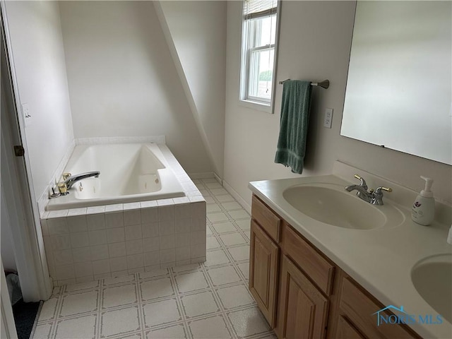 20515 Lockwood Rd, Defiance, OH 43512 - full bath featuring a tub with jets, double vanity, and tile patterned floors