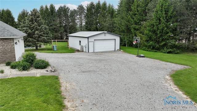 9389 County Road N2, Napoleon, OH 43535 - detached garage featuring view of scattered trees