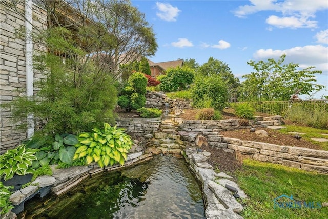 3051 Deep Water Ln, Maumee, OH 43537 - view of yard featuring a small pond
