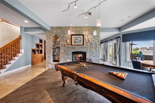 3051 Deep Water Ln, Maumee, OH 43537 - rec room featuring a stone fireplace, billiards, wood finished floors, and recessed lighting