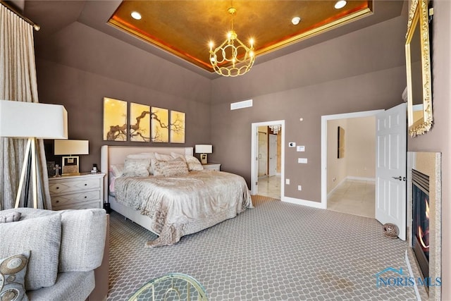 3051 Deep Water Ln, Maumee, OH 43537 - bedroom featuring a raised ceiling, recessed lighting, carpet flooring, a towering ceiling, and ensuite bathroom