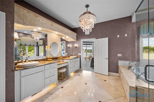 3051 Deep Water Ln, Maumee, OH 43537 - full bathroom with a chandelier, vanity, a bath, and tile patterned flooring