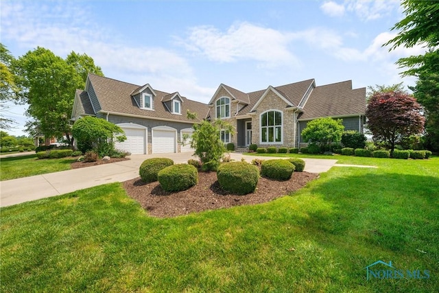 3051 Deep Water Ln, Maumee, OH 43537 - view of front of home featuring a front lawn and driveway