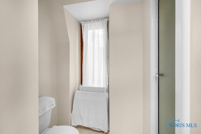 4123 Shamley Green Dr, Toledo, OH 43623 - full bathroom with toilet, tile patterned flooring, and a shower with door