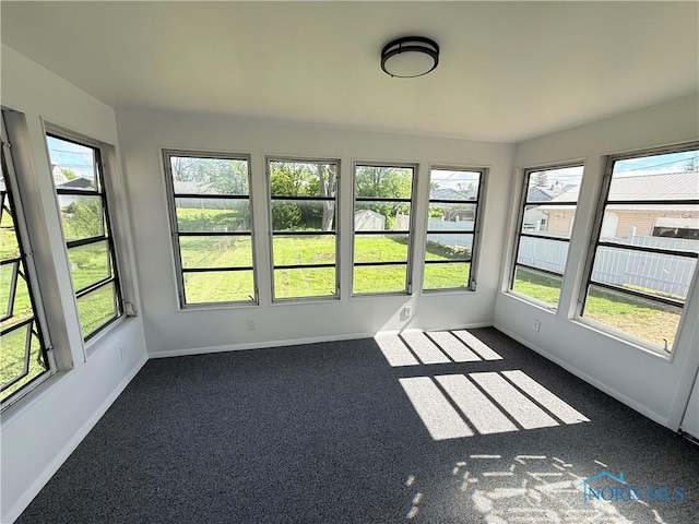 2655 101st St, Toledo, OH 43611 - unfurnished sunroom featuring plenty of natural light