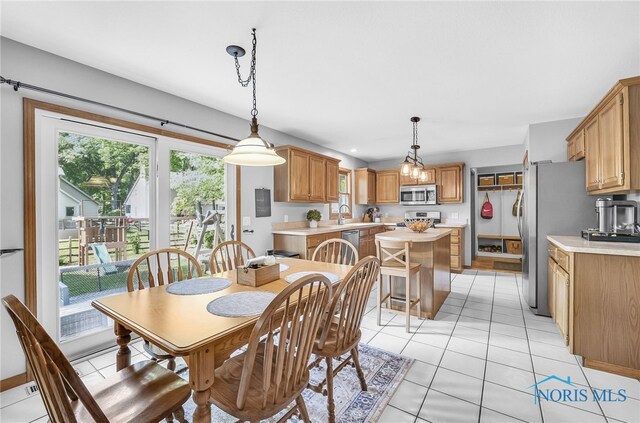 8225 Hidden Forest Dr, Holland, OH 43528 - dining area with light tile patterned flooring