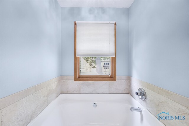 8225 Hidden Forest Dr, Holland, OH 43528 - full bath with a garden tub