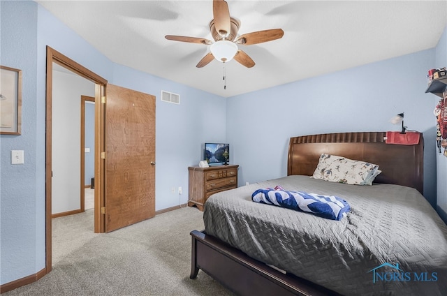 8225 Hidden Forest Dr, Holland, OH 43528 - carpeted bedroom with ceiling fan and baseboards