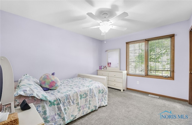 8225 Hidden Forest Dr, Holland, OH 43528 - carpeted bedroom featuring baseboards and ceiling fan